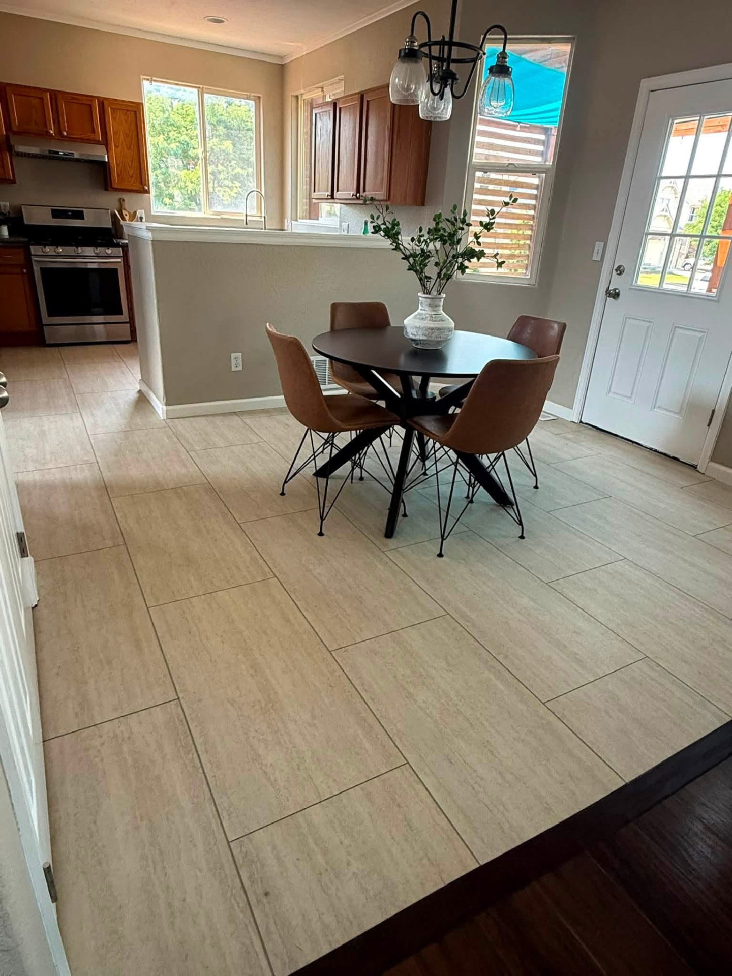 Dining area with new large-format tile flooring