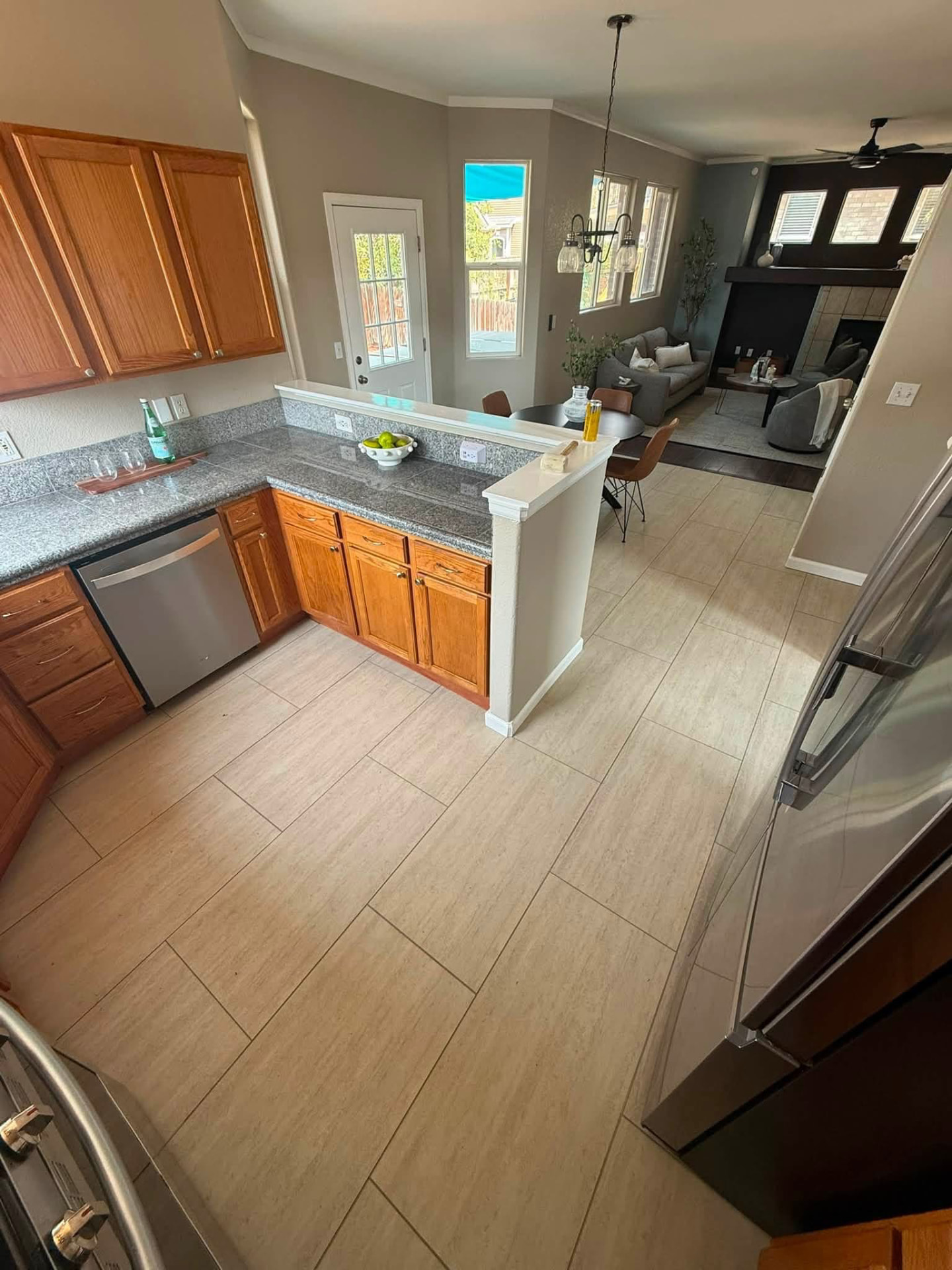 Kitchen with new large-format tile flooring